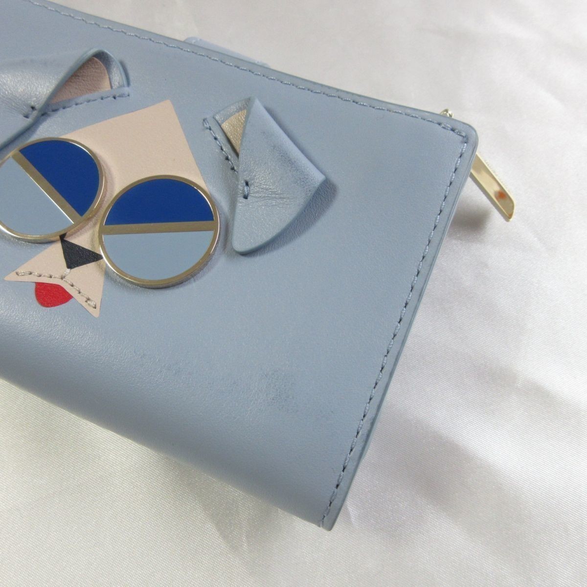 良品 Kate Spade New York ケイトスペード Spademals 犬モチーフ カウレザー 二つ折り財布 ウォレット ライトブルー 水色 051 財布 売買されたオークション情報 Yahooの商品情報をアーカイブ公開 オークファン Aucfan Com