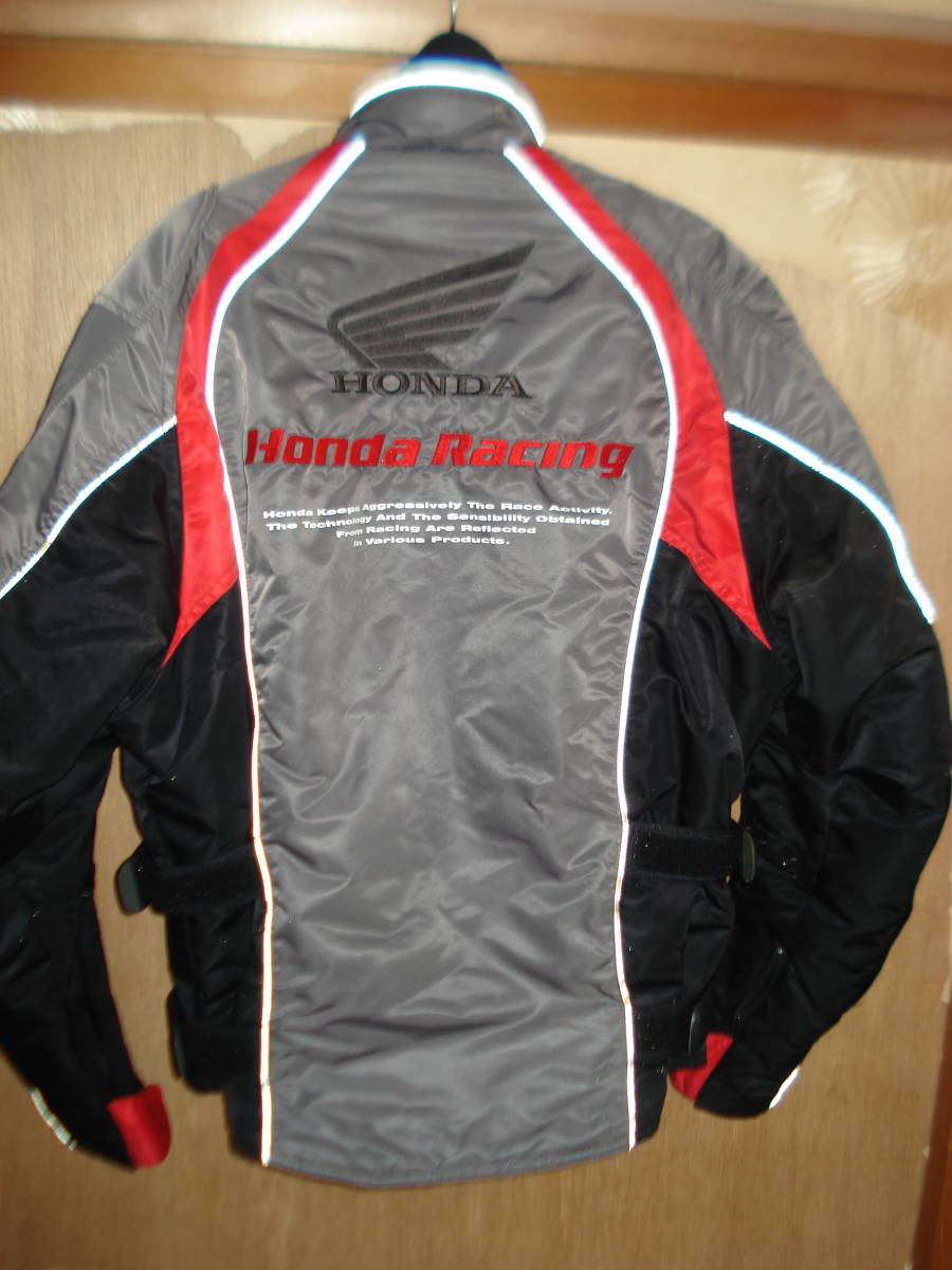 HONDA MOTORCYCLE｜ホンダモーターサイクルのナイロンジャケット通販 ナイロンジャケット ホンダ レーシングジャケット MOTORCYCLE APPAREL レディース メンズ Track up Jacket 百花繚乱 Black MUSINSA公式 ジャケット（素材（生地・毛糸）ナイロン）（メンズ