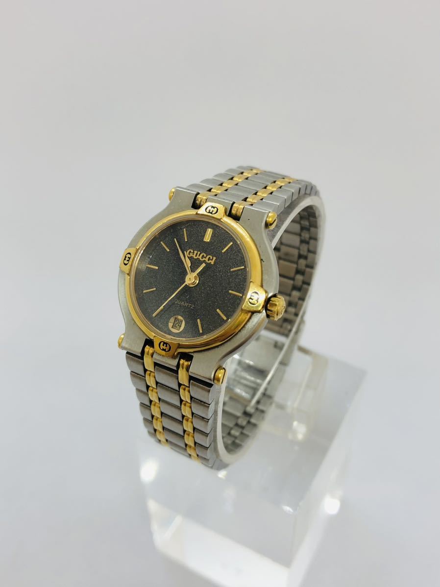 GUCCI 9000L クォーツ シルバー×ゴールド系 ブラック文字盤 レディース