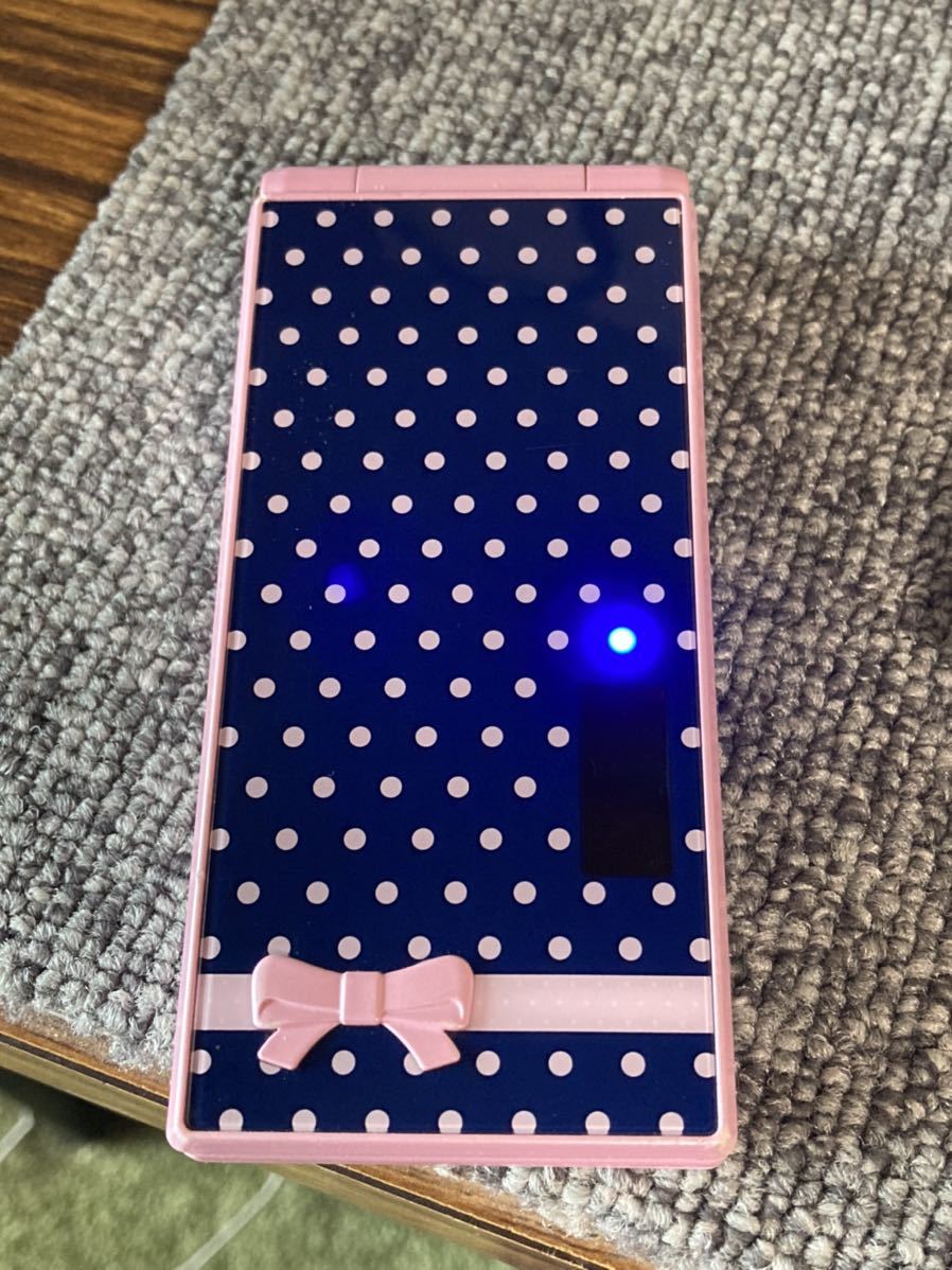 ドコモ　F06d　ガラケー　携帯電話　docomo STYLE series F-06D Girls' 　ハッピーピンク ガールズ　リボン　ドット　P27