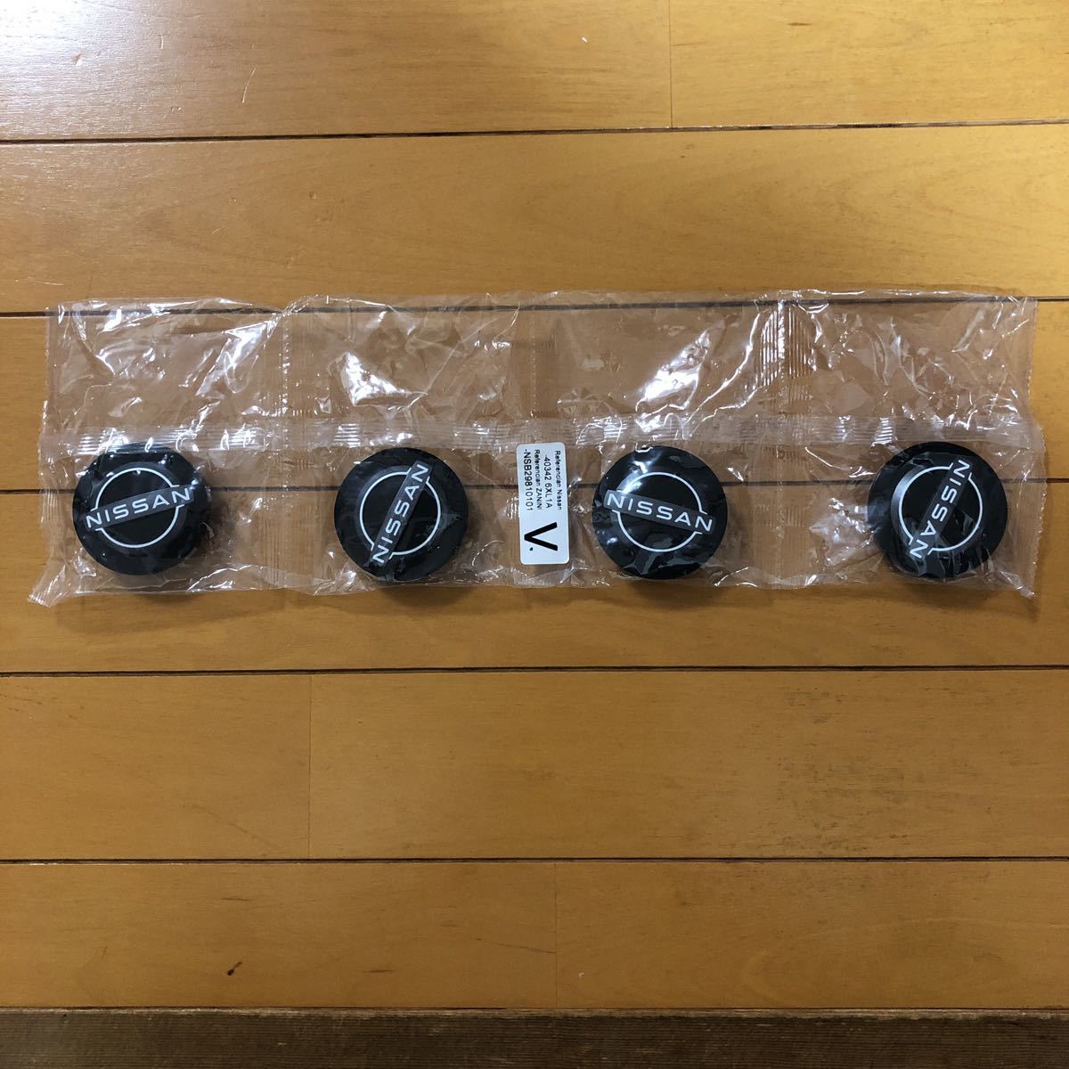 283本日セール4【送込】日産NOTE ノート納車外しE13ホイールキャップ1枚 -