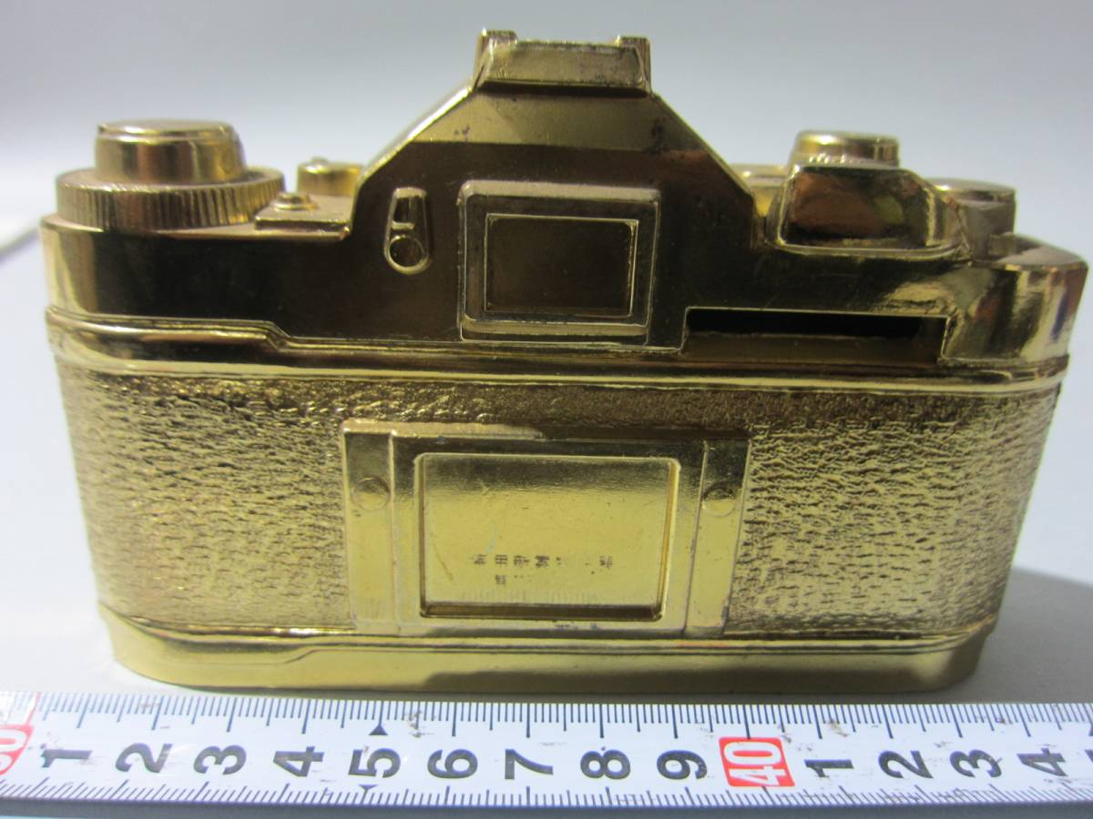 昭和レトロ 未使用展示品 《当時物 Canon キャノン A-1 実物大 カメラ 貯金箱 鋳物 金色 》　年末カメラ店整理品 非売品 販促品 台座付き