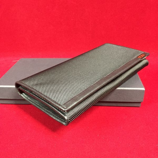 トゥミ TUMI メンズ 二つ折り長財布 ブラック 小銭入れあり TB22 財布 トゥミ 革 折りたたみ財布 二つ折り財布 ラウンドファスナー