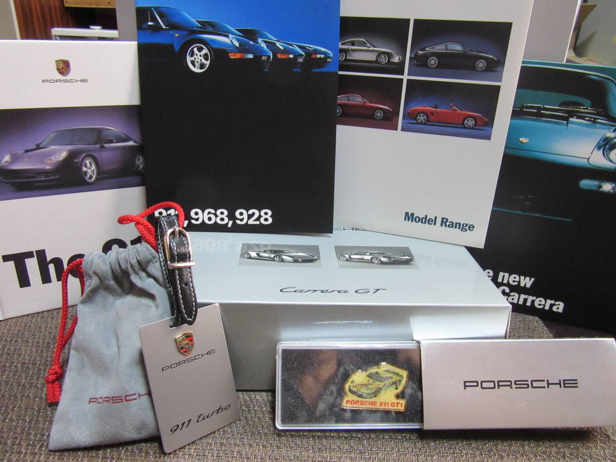 日本新品 【美品】ミニカー　『１/43　ポルシェ　カレラGT　2台セット』＆　『PORSCHE　グッズ』＆　『ポルシェ　カタログ多数』まとめて