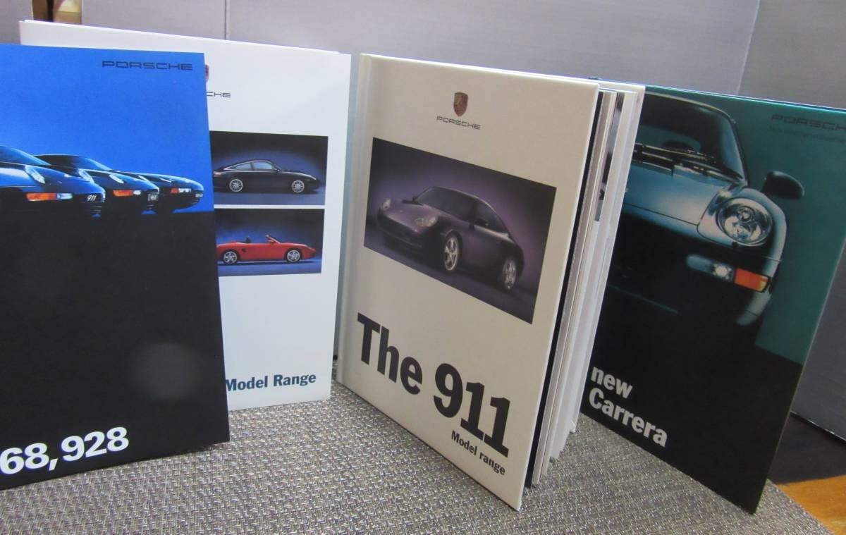 日本新品 【美品】ミニカー　『１/43　ポルシェ　カレラGT　2台セット』＆　『PORSCHE　グッズ』＆　『ポルシェ　カタログ多数』まとめて