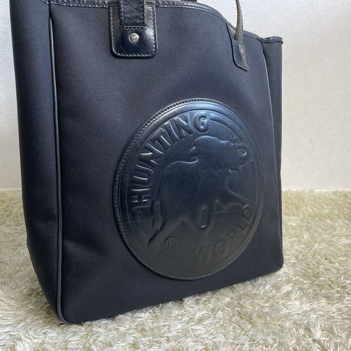 1円 美品 ビッグロゴ ハンティングワールド トートバッグ ビジネスバッグ でかロゴ ブラック レザー 男女兼用 肩掛け可能 ハンティングワールド WORLD トートバッグ（柄ロゴ）の通販 美品HUNTING ショルダーバッグ バチュークロス