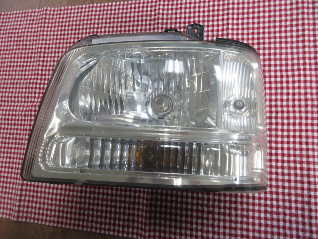 スズキ　エブリィワゴン　DA62W　ハロゲンヘッドライト　左　ヘッドランプ　KOITO100-32673