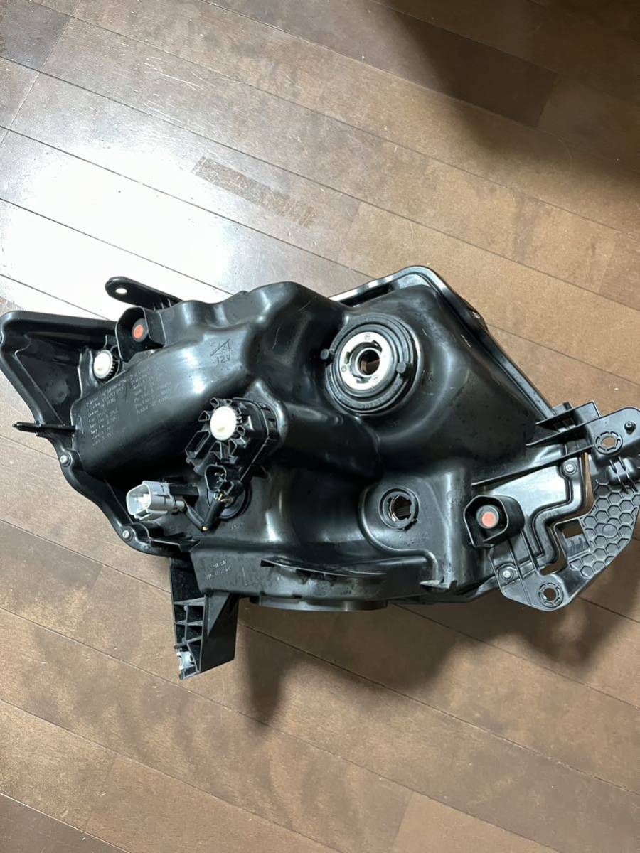 タントカスタム 左ヘッドライト LA600S タントカスタム LA600S 左