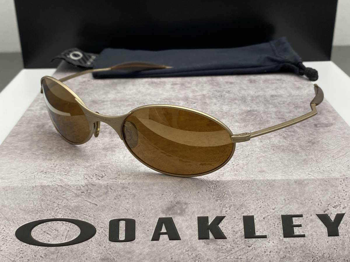 90s☆OAKLEYオークリー E-WIREイーワイヤー マットゴールド 