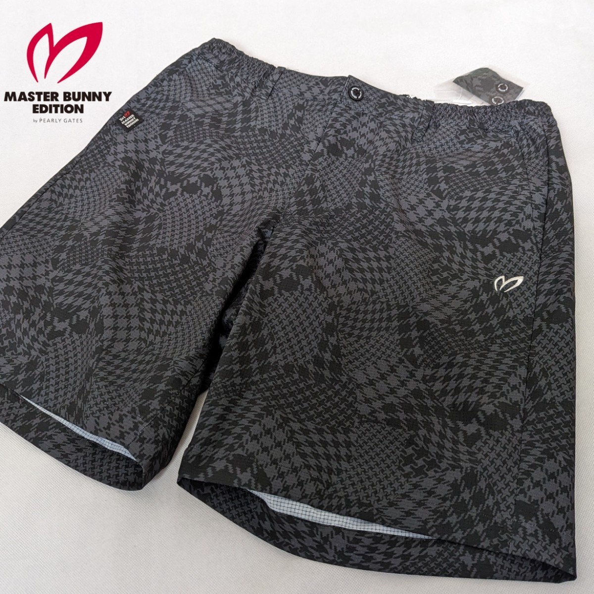 ★新品正規品 PEARLYGATES/マスターバニーメンズ 変形千鳥プリントドライクロスショートパンツ SIZE 5(L)　らくらくゴム入り