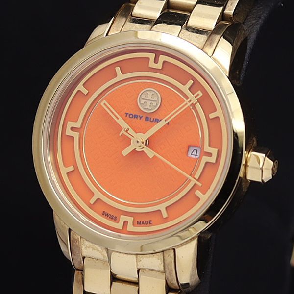 1円 稼働 良品 箱/コマ4付 トリーバーチ QZ TRB1012 オレンジ文字盤 デイト ラウンド レディース腕時計 0551100SMD