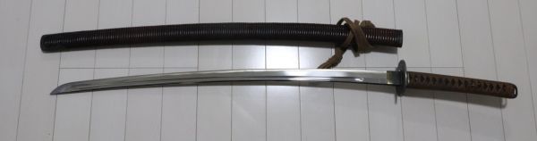 居合刀 とてもかっこいい籐巻の鞘に鎚目の縁頭 鍔 鐺に馬の図の目貫の