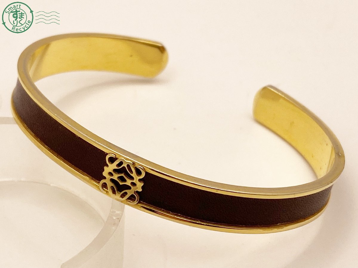10423750　△ LOEWE ロエベ バングル アナグラム ロゴ ゴールド×赤茶系 腕回り 約16.5cm レディース アクセサリー 中古