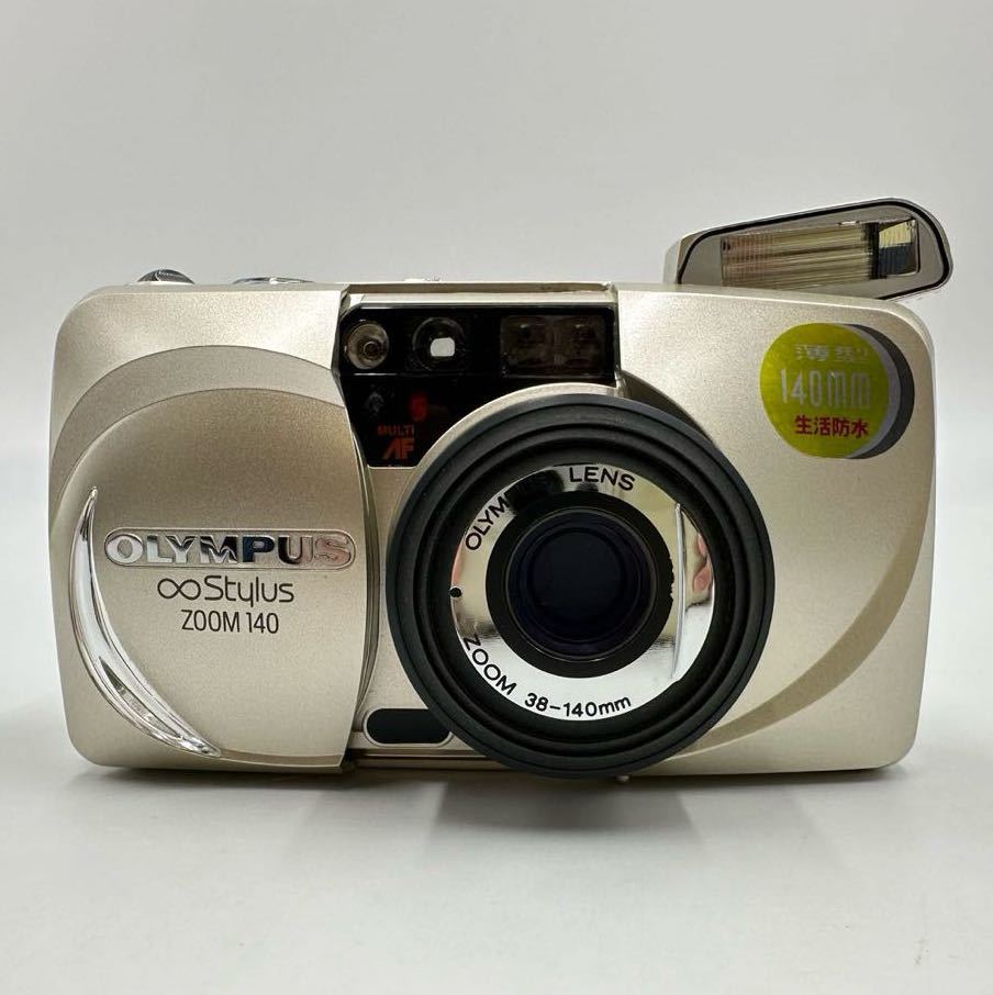 動作品 オリンパス インフィニティ スタイラスズーム140 OLYMPUS Stylus ZOOM140 38-140mm フィルムカメラ 生活防水 シャンパンゴールド