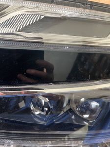 トヨタ純正後期型80ヴォクシー左ライトジャンク品