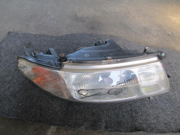 エミーナ CXR11 右ヘッドライト 28-100