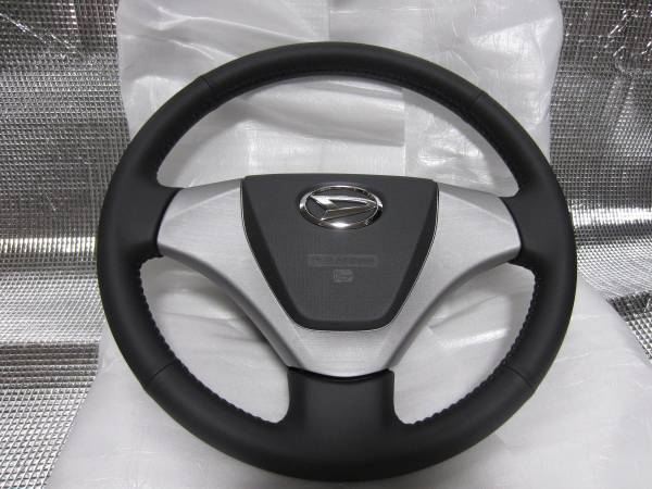 ☆ダイハツ☆ムーヴ☆純正☆LA100S☆革ハンドル☆新車外し☆_1