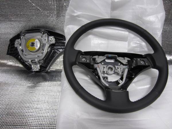 ☆ダイハツ☆ムーヴ☆純正☆LA100S☆革ハンドル☆新車外し☆_2