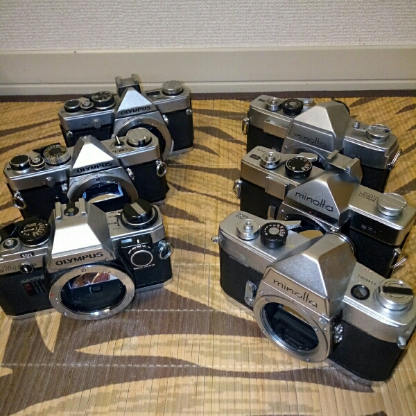 MINOLTASRT101とOLYMPUSのカメラです。 Olympus OM-1 vs Minolta SRT