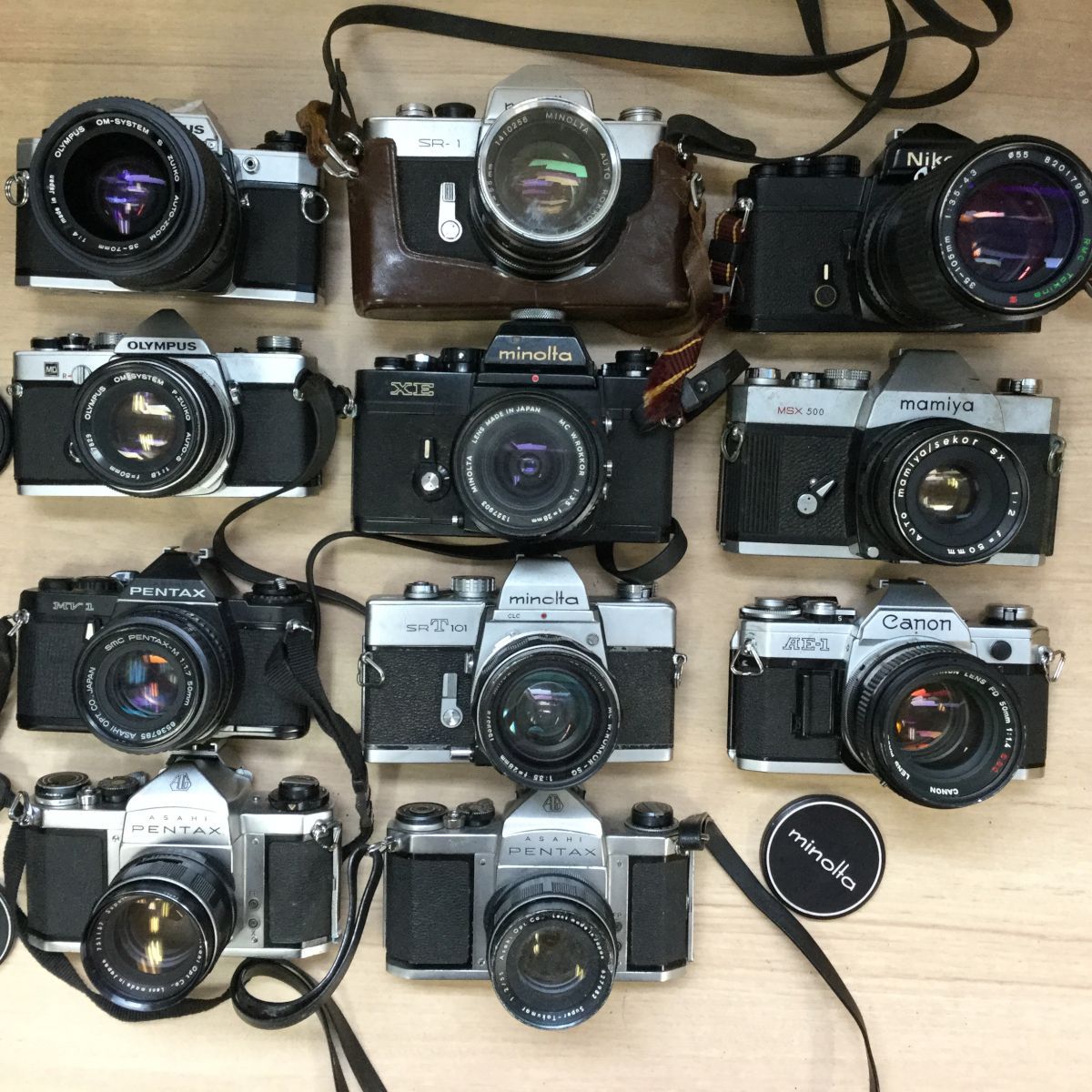 Olympus OM-10 the OM-1 of Canon and - AE-1 Bla hand from 