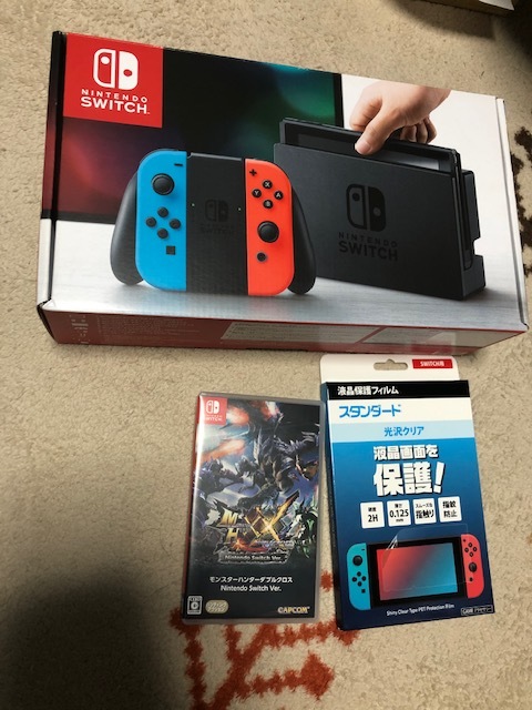 Nintendo Switch 本体のみ　フィルム付き 開封済み未使用）任天堂スイッチ本体、液晶保護使用フィルム、カセット
