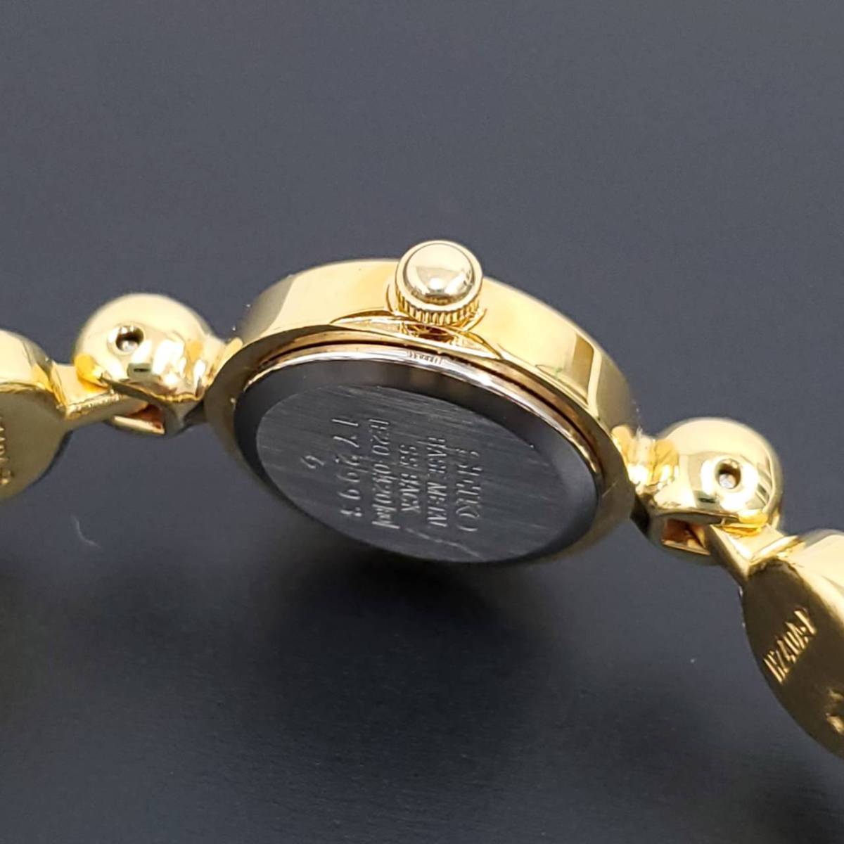 SEIKO セイコー 1E20-0420 クォーツ ゴールドカラー 石付き レディース 