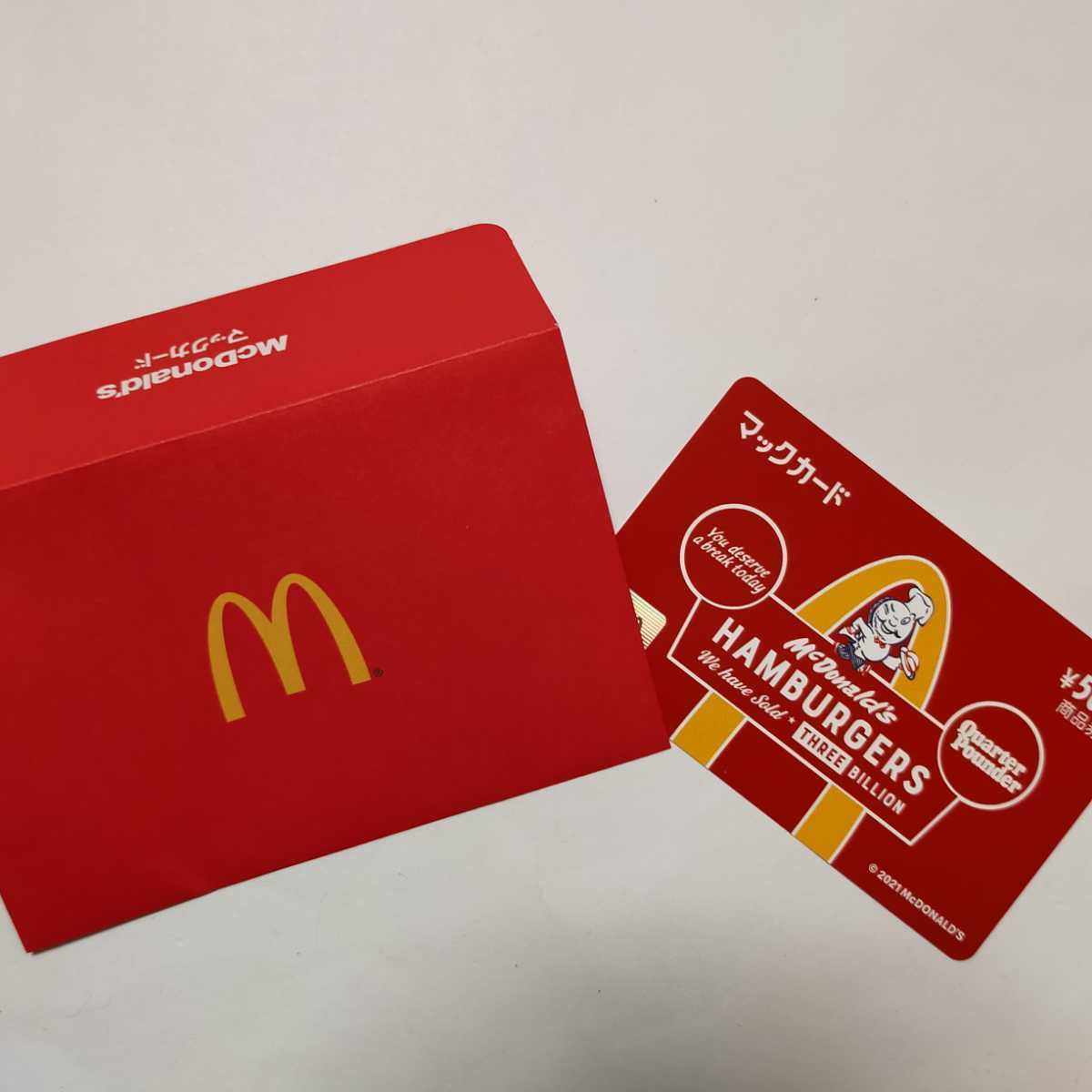 マックカード 50周年限定デザイン | SMILE 赤色 500円分 キャラクター
